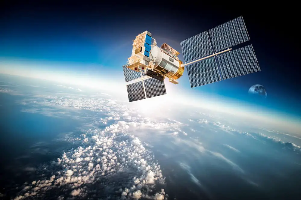 A satellite in space orbiting the earth