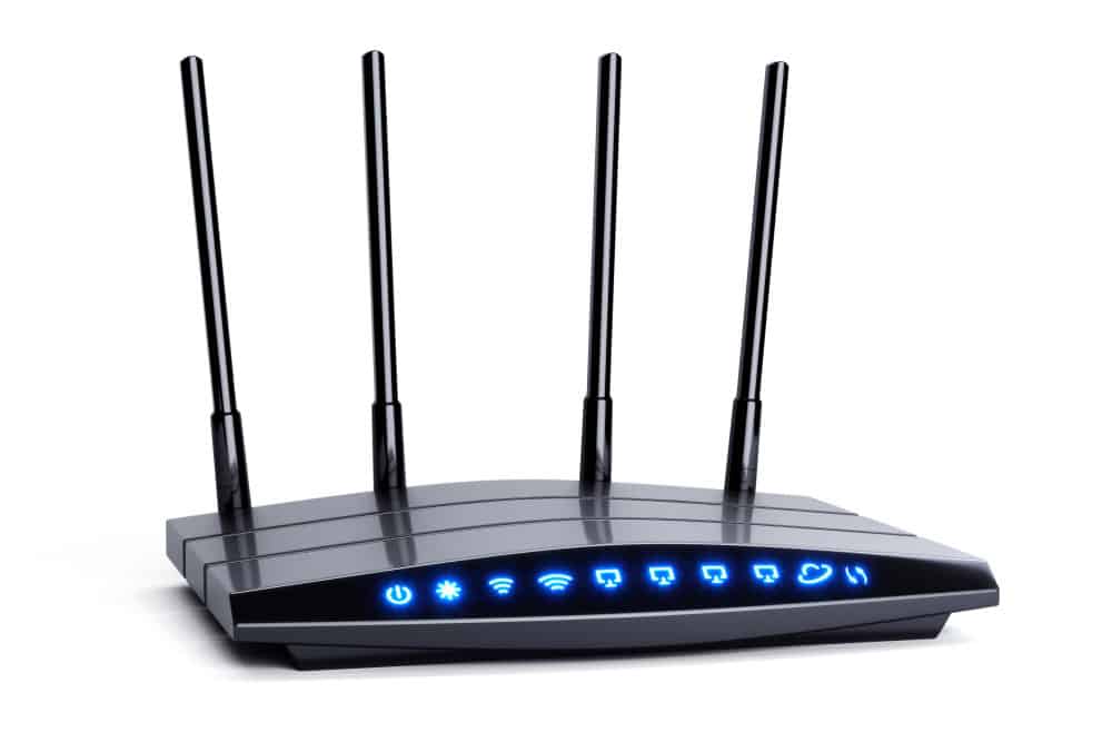 A modern Wi-Fi router with four antennas
