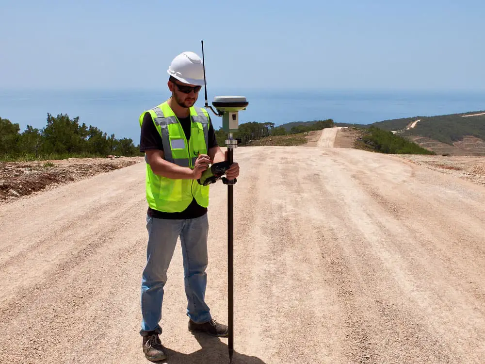 A GNSS satellite receiver on a GPS pole