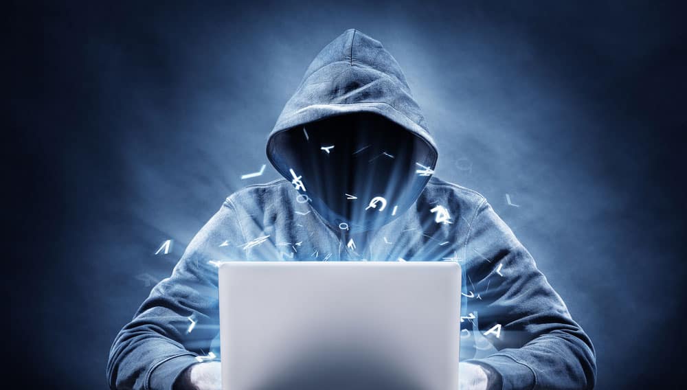 Picture of a hacker on a computer 