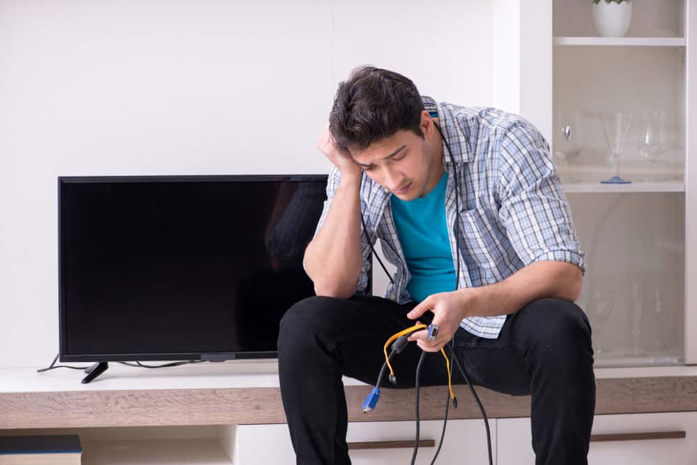 A man with TV Cables. 