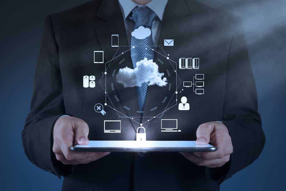 Businessman working with a cloud computing diagram