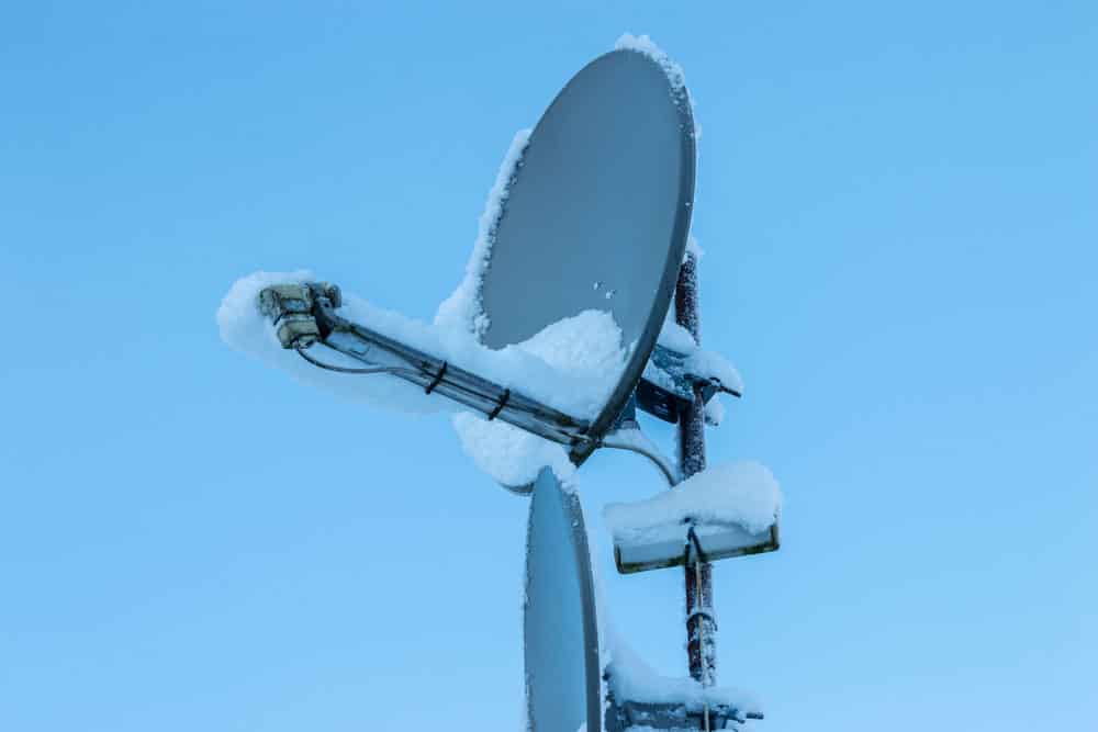 Snow-covered satellite dish
