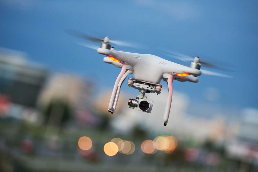 A drone with a digital camera. 