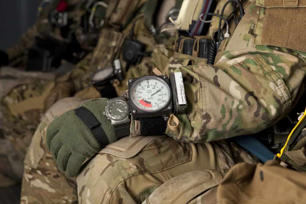 A soldier with a military watch 