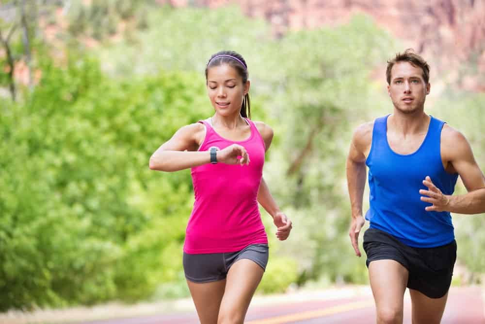 A person running with a GPS watch