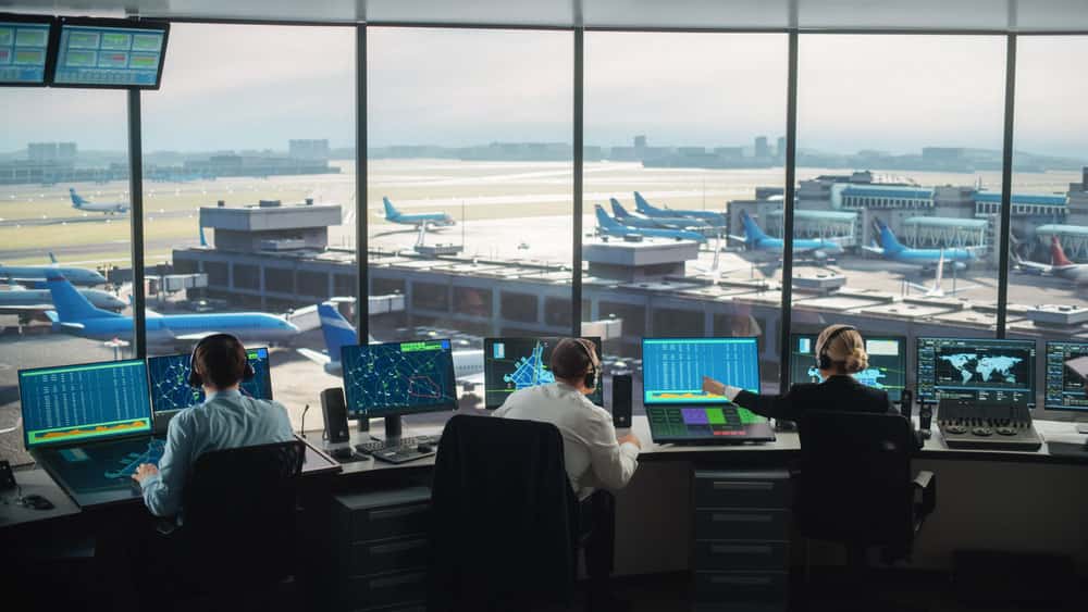 Are Military GPS Tests Threatening Airlines? An air traffic control team at work
