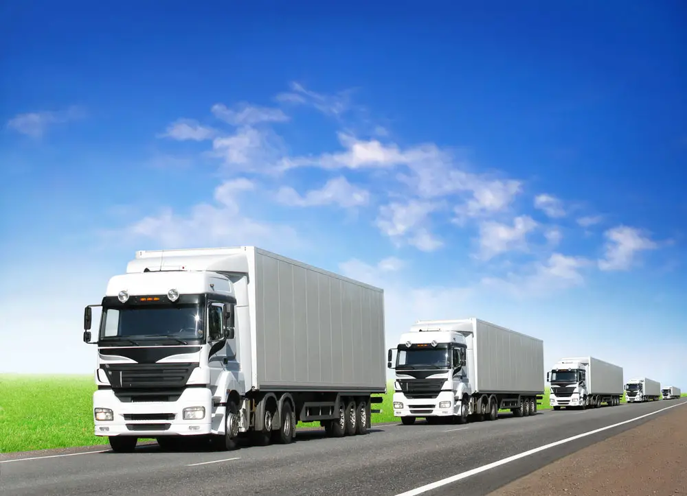 A caravan of trucks on the highway