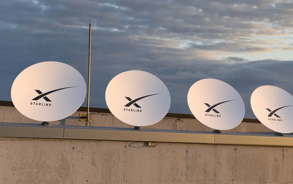 Four round Starlink antennas