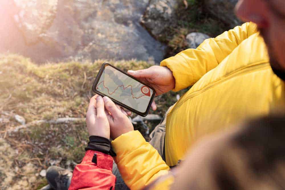 Hikers using a GPS app