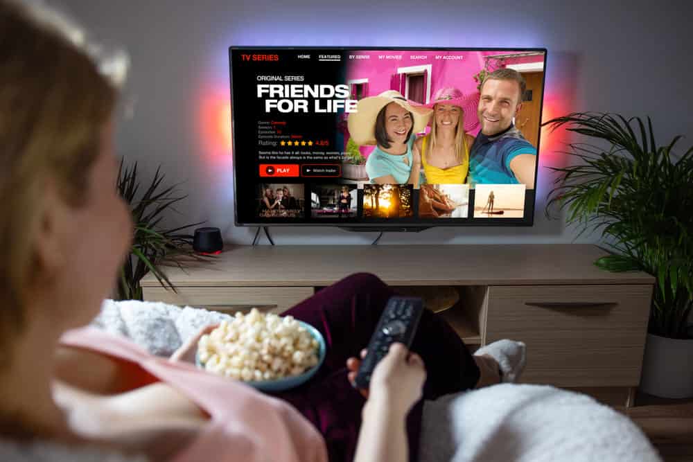 A woman streaming content at home