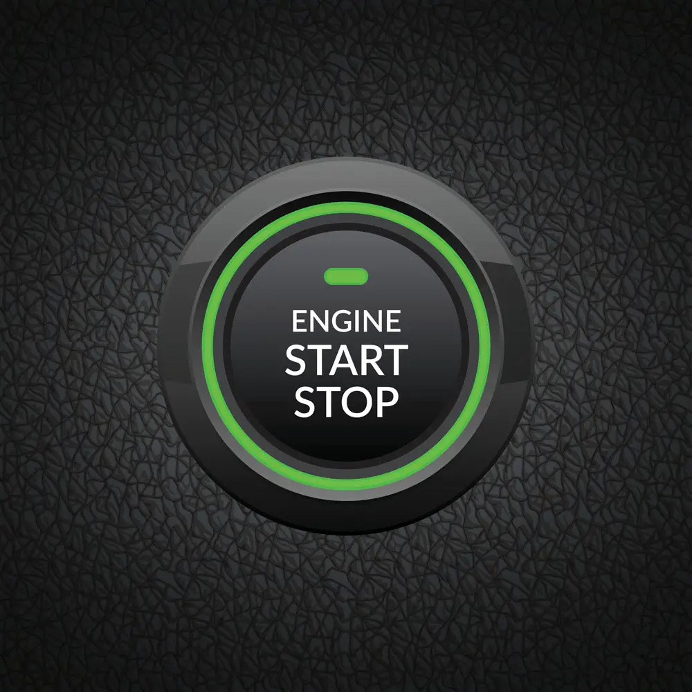 An engine start-stop button. 