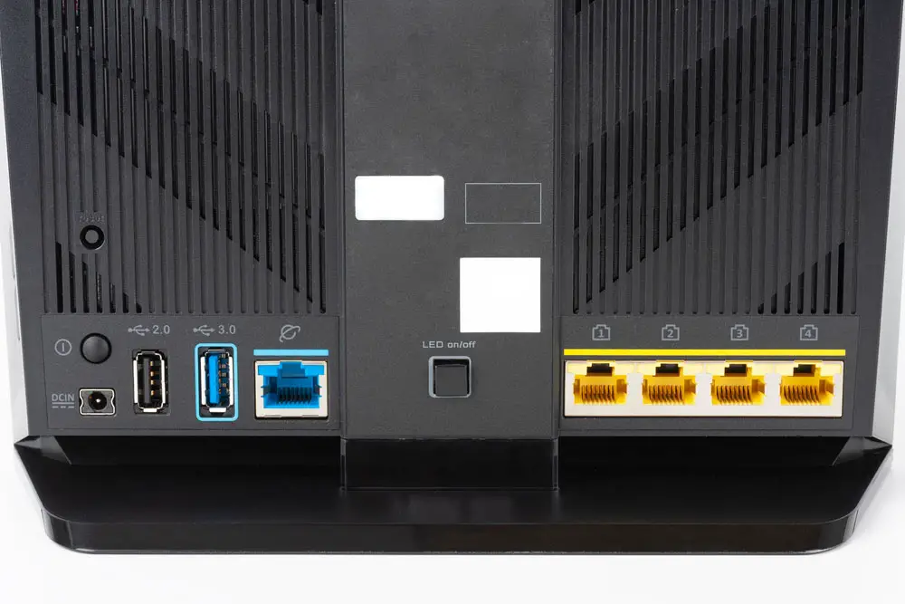 A router with five Gigabit ethernet ports and two USB ports