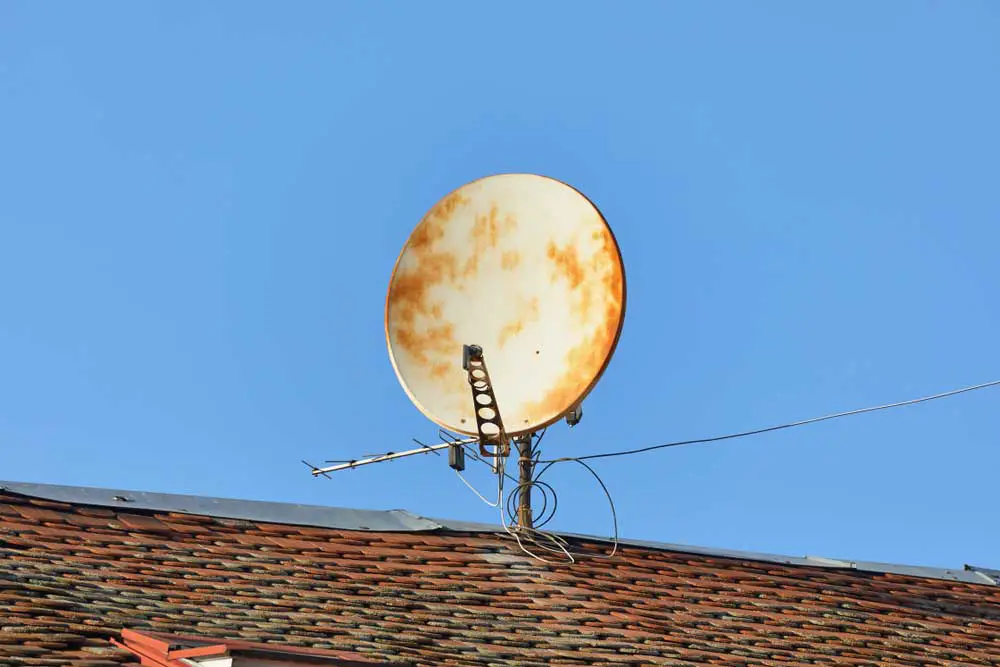 An old satellite dish on the roof